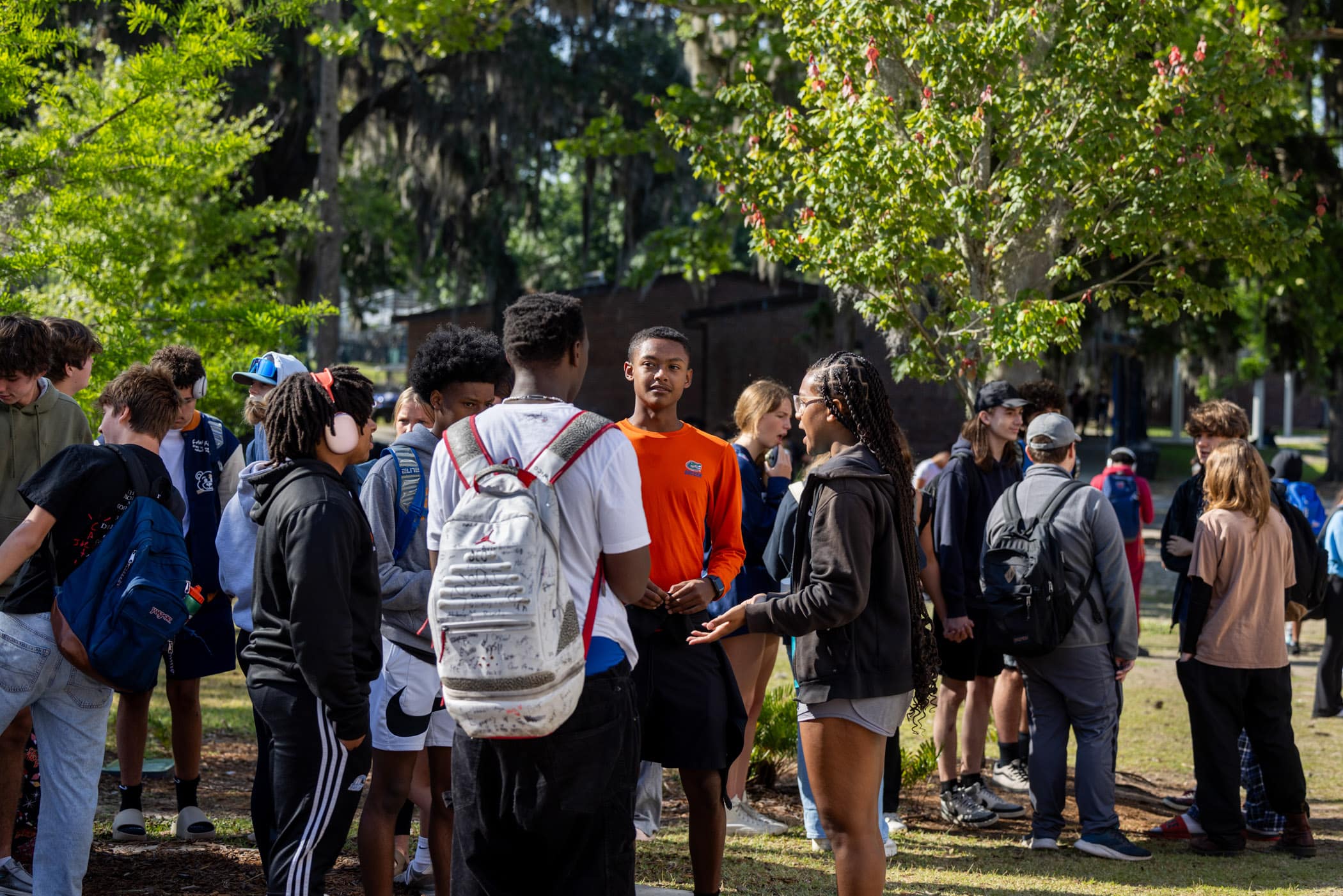 High School students meeting outside